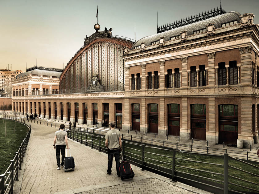 Travelers accessing Atocha station