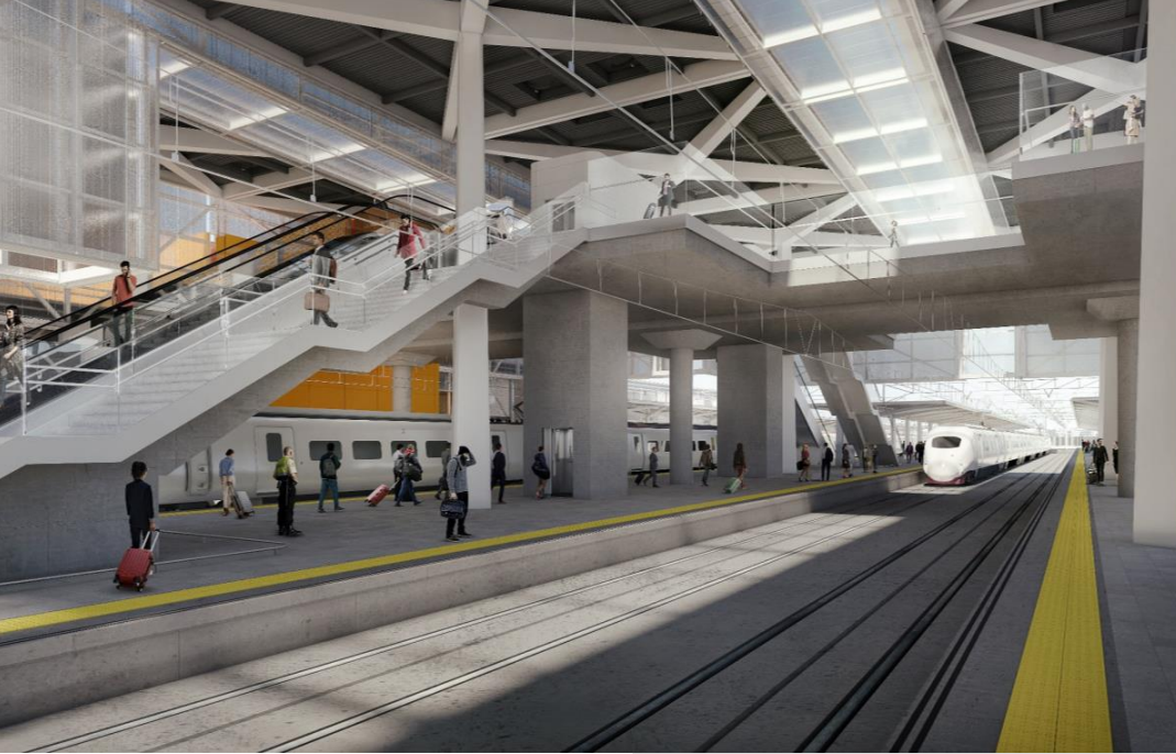 Vista interior de los accesos a andenes y de los espacios de distribución de viajeros de la futura estación.