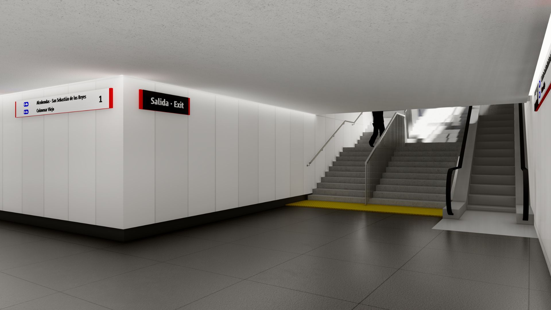 Vista del paso inferior de conexión entre andenes de la futura estación Parla Norte, dotado de escaleras y elementos de accesibilidad.