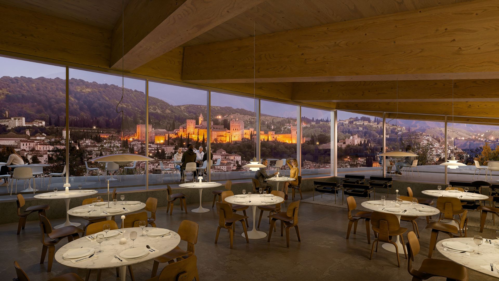 La estación incorporará espacios de estancia y restauración vinculados a la plaza de acceso, con amplias vistas sobre el entorno urbano de Granada.